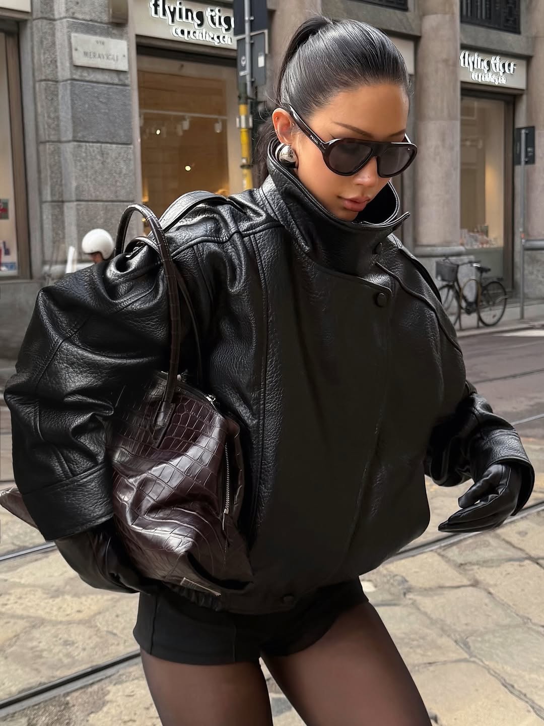 Lumina Wear Felicia oversized structured high-neck faux leather jacket for women, featuring a modern, bold design and sleek black finish.
