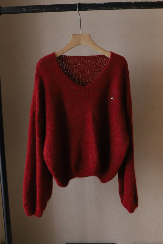 Lumina Wear Fiorentina vintage V-neck sweater with soft, draped fabric and comfortable fit, displayed on a neutral background.