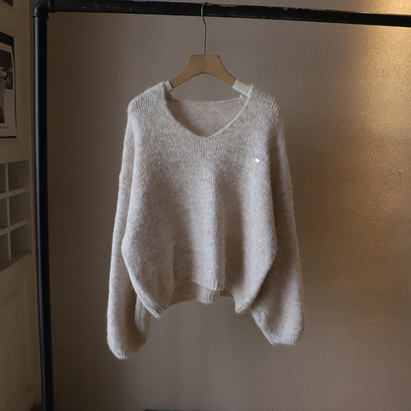 Lumina Wear Fiorentina soft draped vintage V-neck sweater with a comfortable fit, shown on a model in a cozy, relaxed setting.