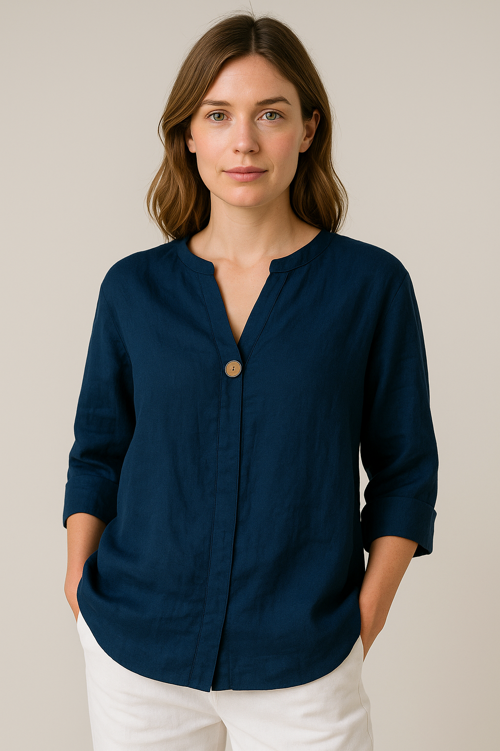 Light blue Gabrielle relaxed fit blouse with button details from Lumina Wear, featuring a casual, comfortable design.