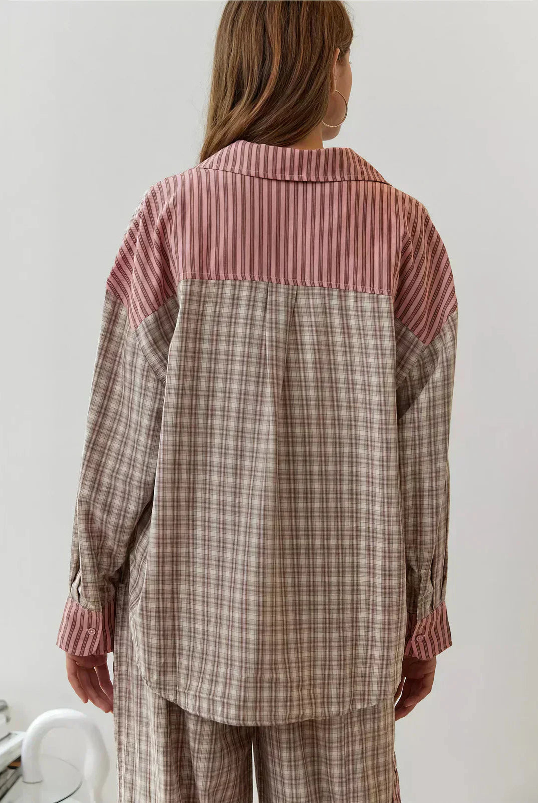 Women’s spring plaid two-piece set by Lumina Wear featuring a coordinated stylish top and skirt in a spring-inspired pattern.