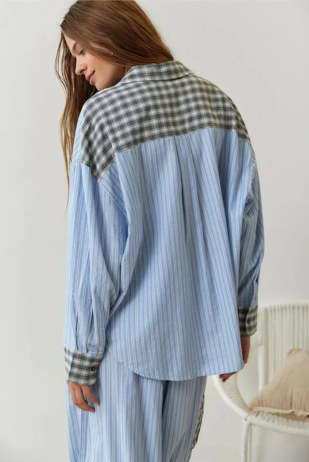 Women's spring plaid two-piece set by Lumina Wear featuring a stylish coordinated top and skirt in a vibrant spring pattern.