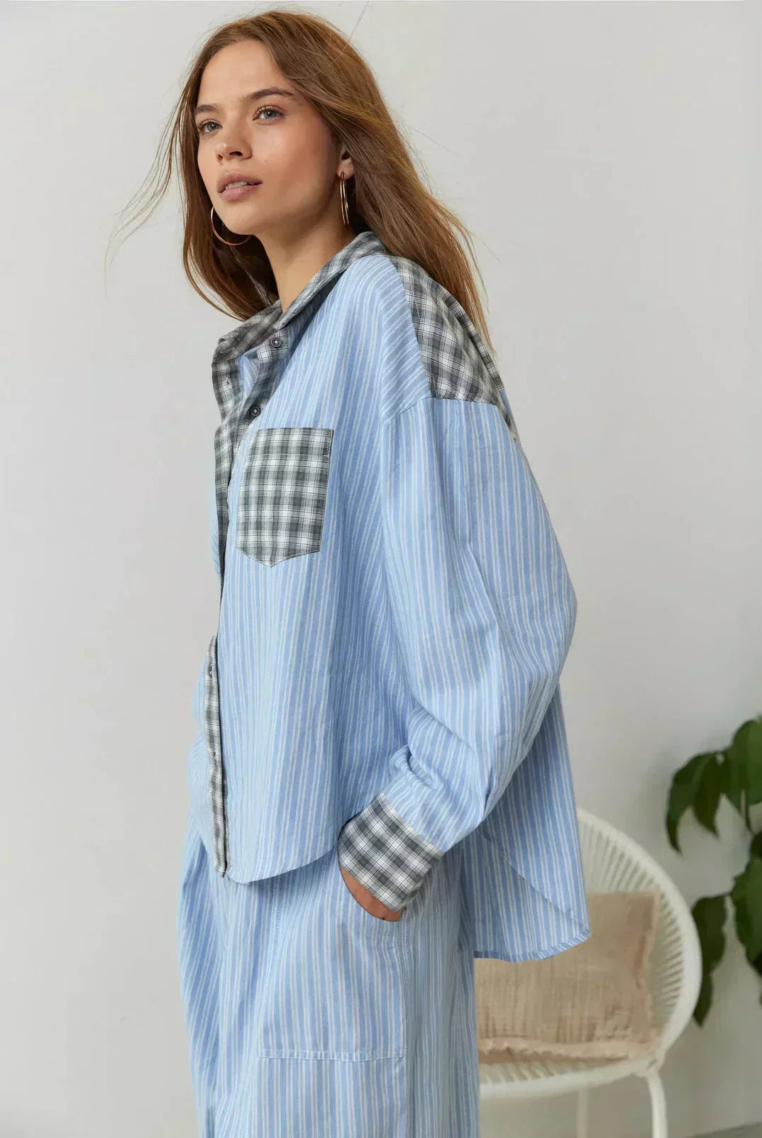 Women’s spring plaid two-piece set by Lumina Wear featuring a coordinated top and skirt in light, stylish fabric.