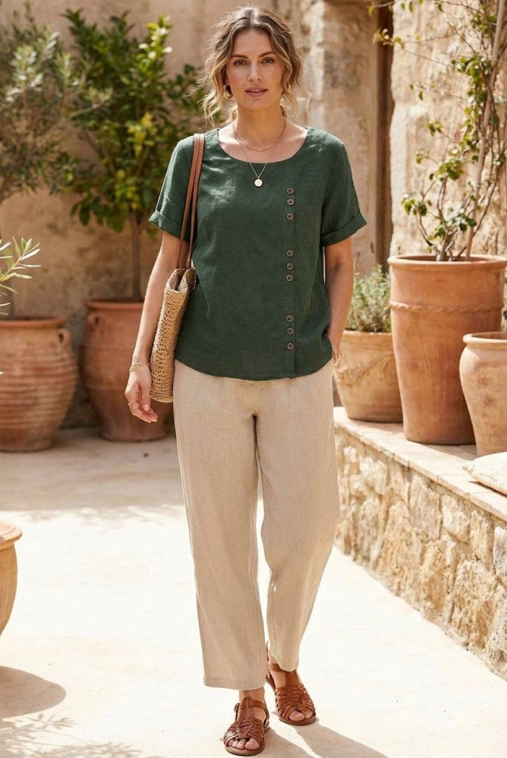 Light beige Lumina Wear relaxed linen blouse with button detail, featuring a loose fit and casual style.