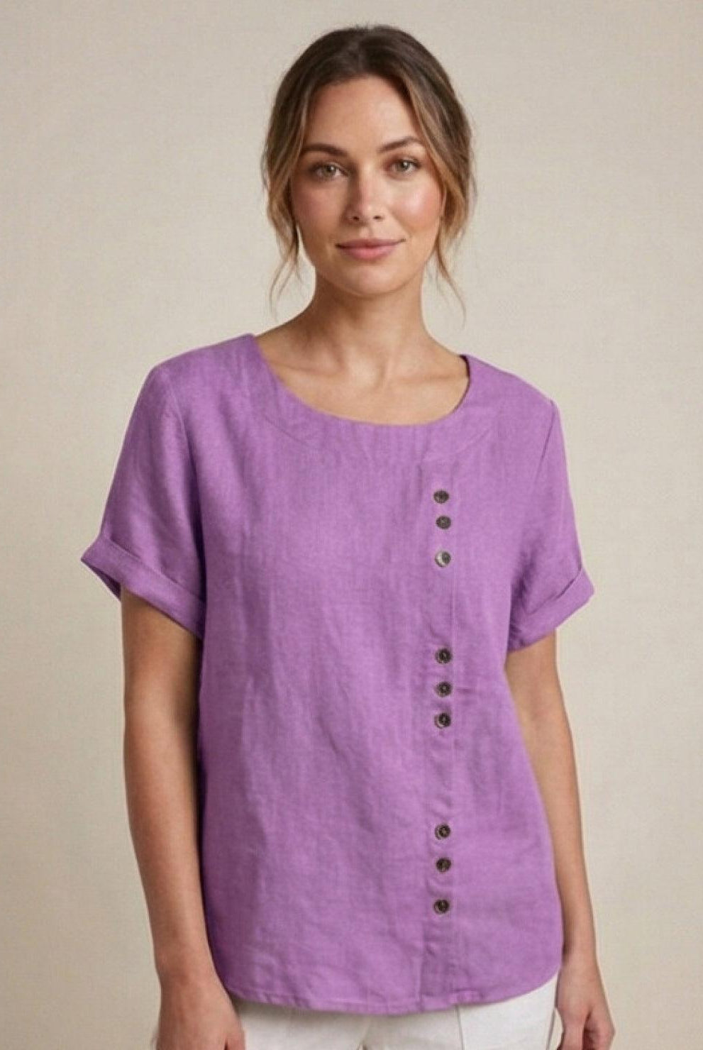 Light beige Lumina Wear Grace linen blouse with relaxed fit and button detail, shown on a model.