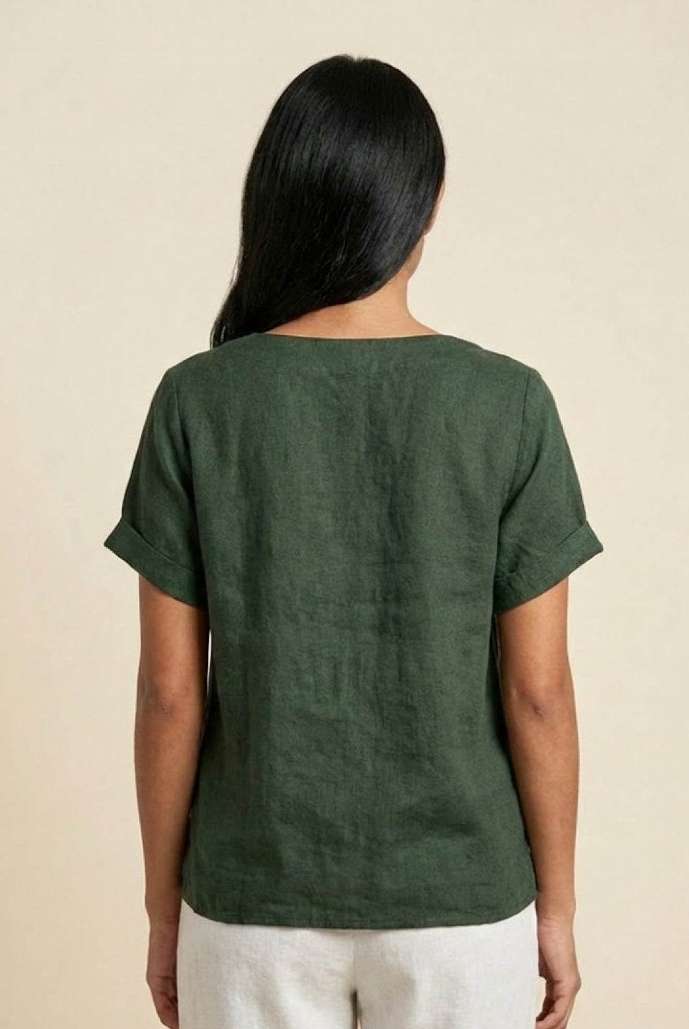 Lumina Wear Grace relaxed linen blouse with button detail, featuring a comfortable fit and stylish design for casual wear.
