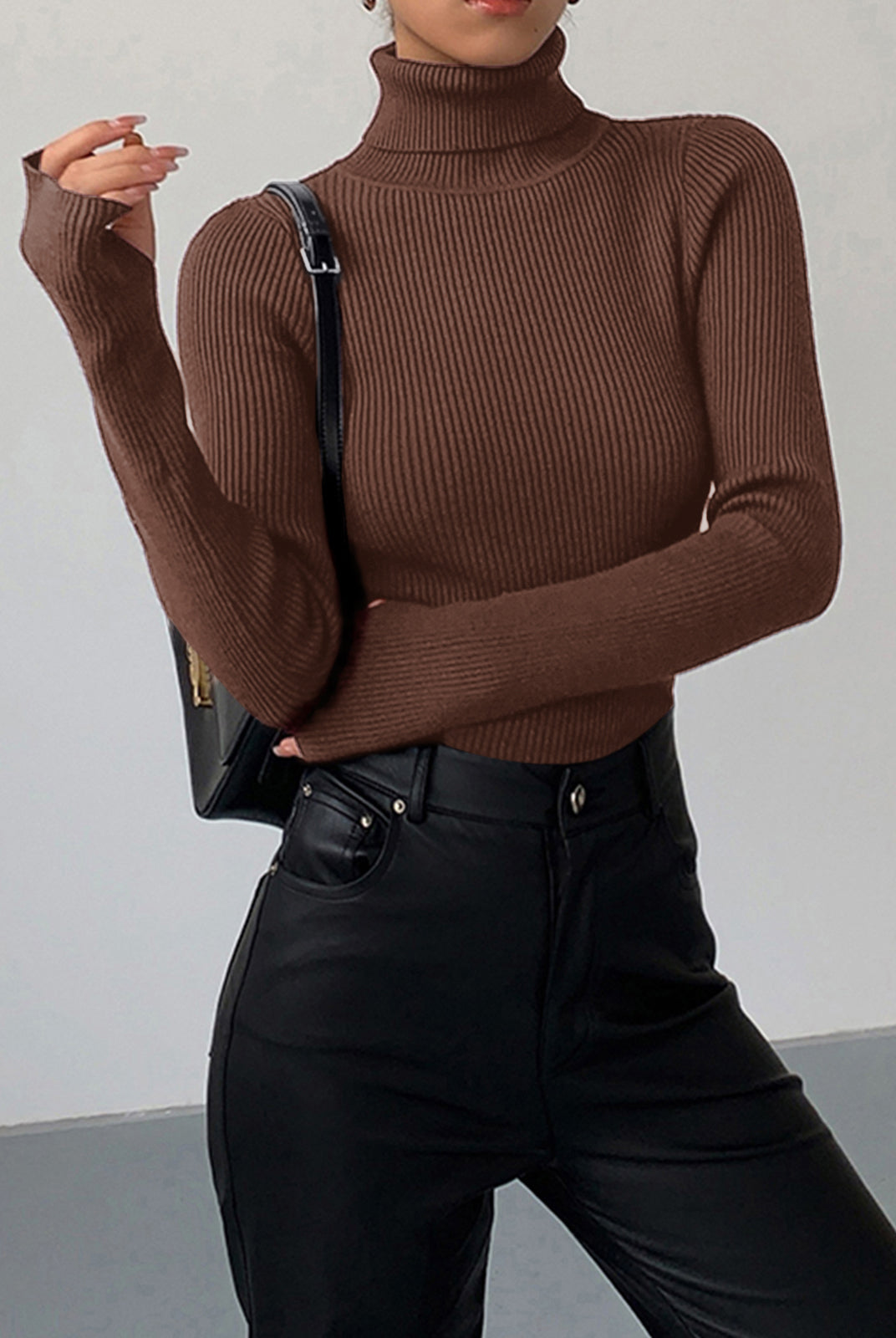 Lumina Wear Hailey sleek minimalist turtleneck top for winter, featuring a fitted design and smooth fabric in a neutral color.