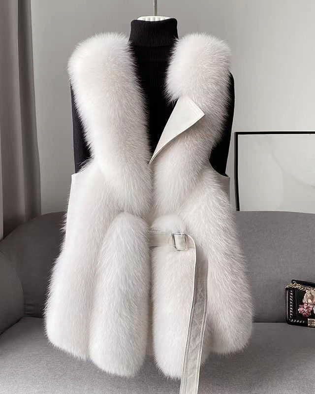 Isabella Lumina Wear belted faux fur vest with leather trim, showcasing a sleek silhouette and stylish design.