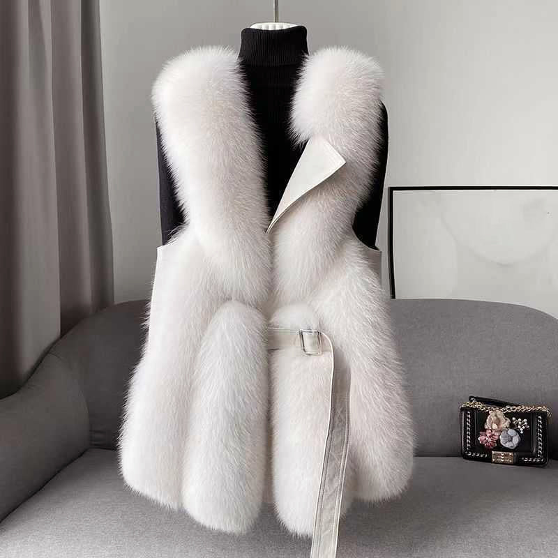 Isabella Lumina faux fur vest with leather trim, belted waist, and sleek silhouette displayed on a model.