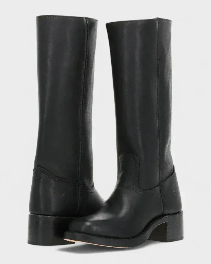 Black leather knee-high orthopedic boots with retro style from Lumina Wear, styled with a classic, vintage-inspired design.