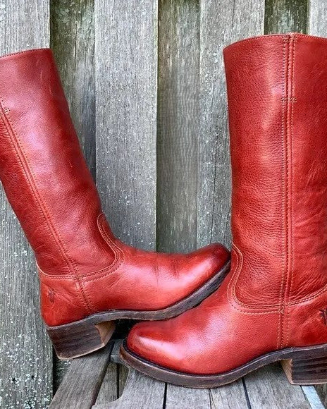 Black leather knee-high orthopedic boots with retro style by Lumina Wear, featuring a classic design and sturdy heel.