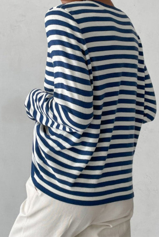 Lumina Wear Isabella bold striped relaxed fit sweater with ribbed neckline, cozy knit, and casual style in the image.