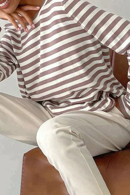 Lumina Wear Isabella bold striped relaxed fit sweater with ribbed neckline, shown in a cozy, casual style.