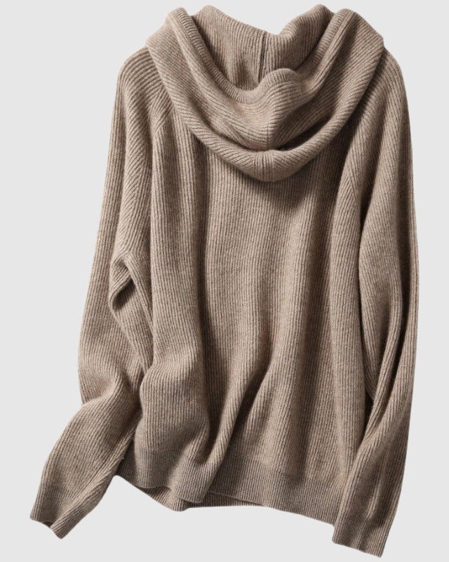 Lumina Wear Isabella cozy hooded thick knit sweater with loose fit, showcasing soft fabric and casual style in natural pose.