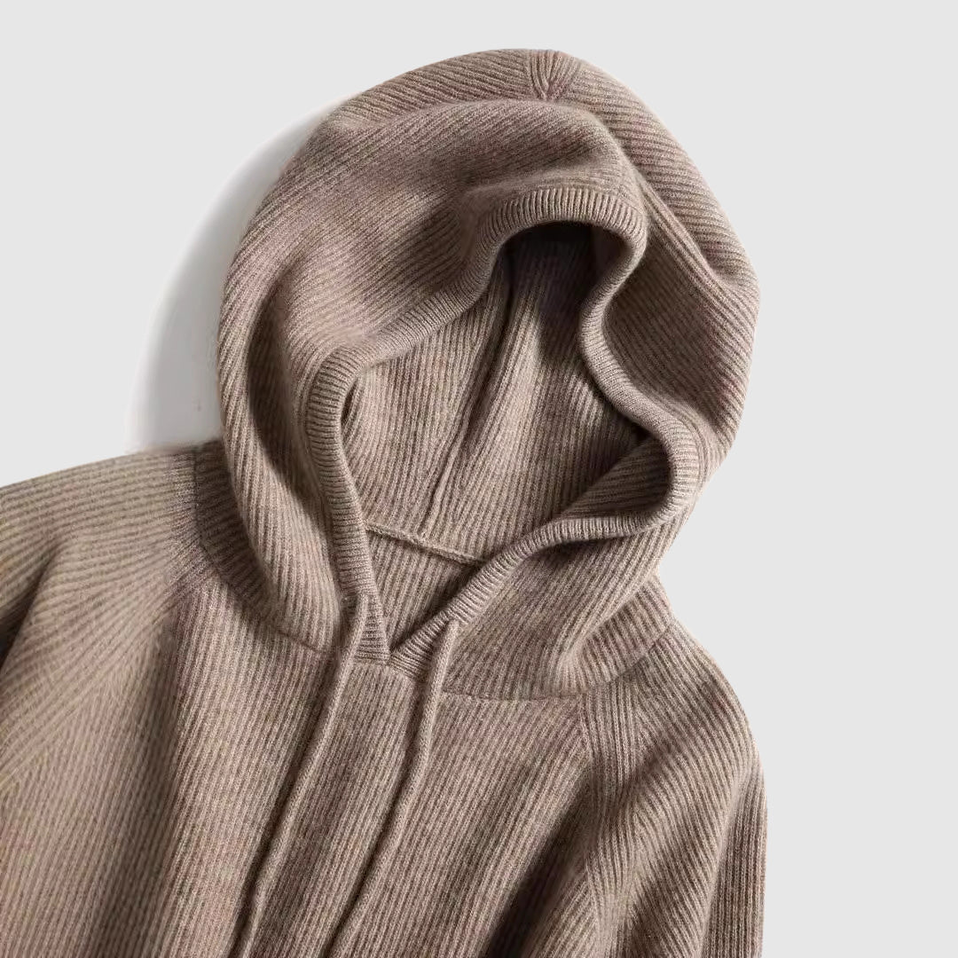 Lumina Wear Isabella cozy hooded thick knit sweater with a loose fit, shown in a soft, textured fabric.