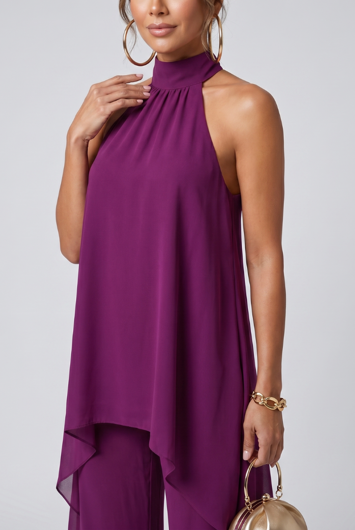 Elegant Juliette two-piece set by Lumina Wear featuring an asymmetric halter top and wide-leg pants, displayed on a model.