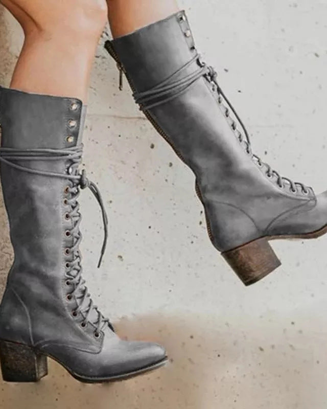 Black knee-high lace-up boots with side zipper from Lumina Wear, stylish and elegant footwear for versatile fashion.