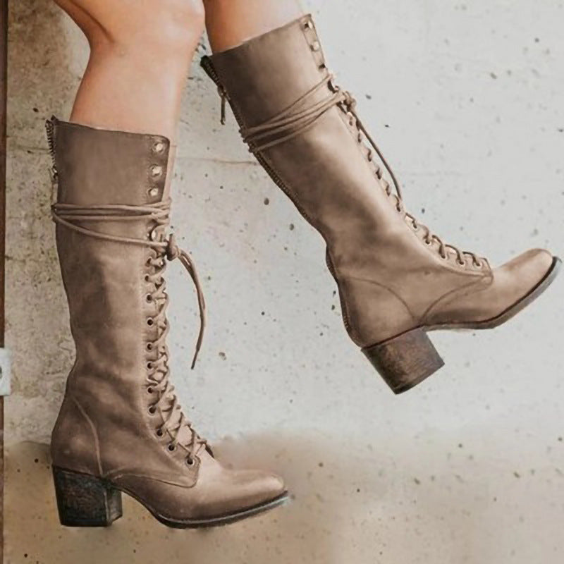 Black knee-high lace-up boots with side zipper from Lumina Wear, featuring an elegant design suitable for women's fashion.