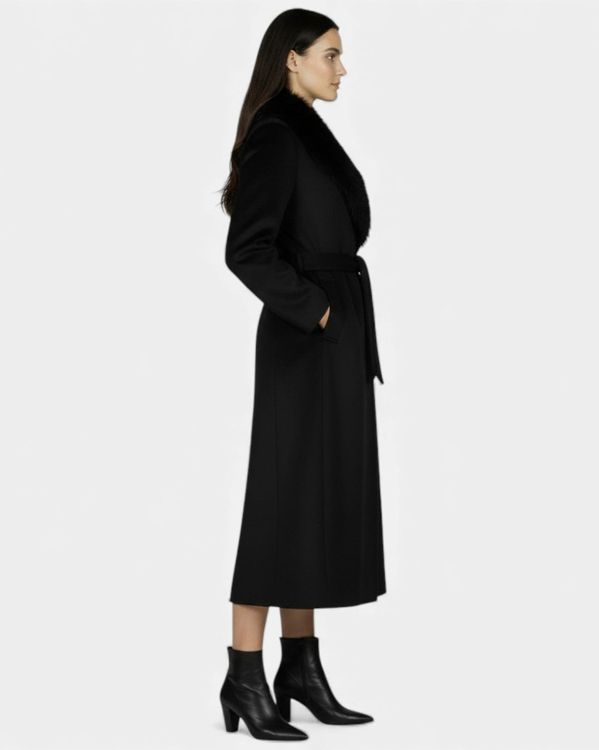 Elegant long wool coat with fur collar by Lumina Wear, featuring a tailored fit and classic style in neutral tones.