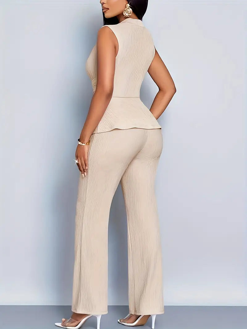 Elegant women's two-piece pants set by Lumina Wear featuring a peplum top and flowing trousers, perfect for stylish occasions.