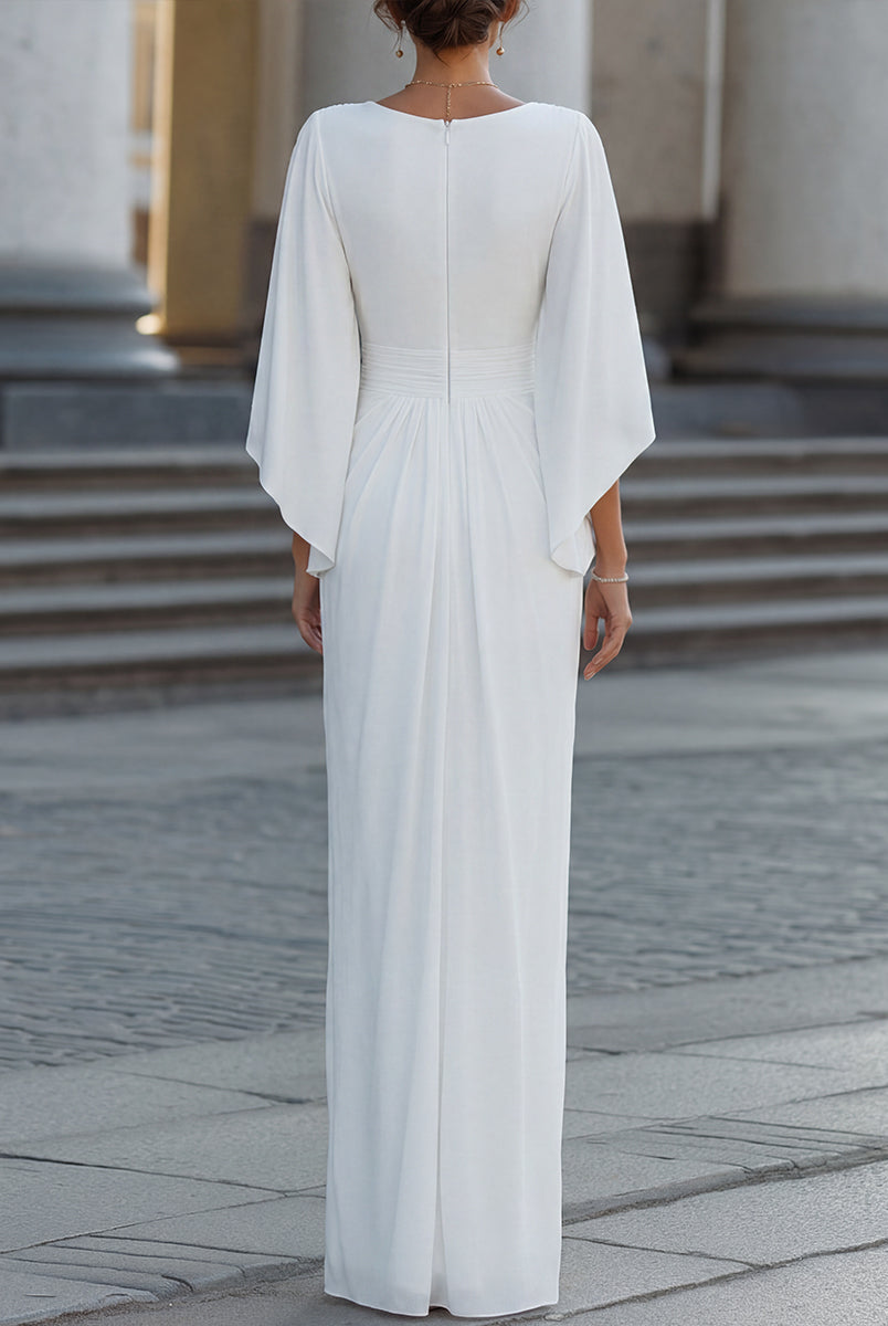 Elegant pleated maxi dress with cape sleeves by Lumina Wear, featuring flowing fabric and sophisticated design.
