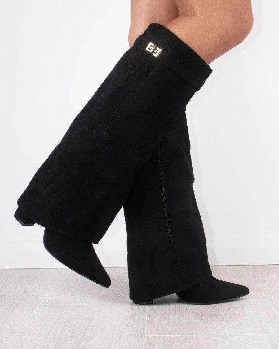 Black knee-high boots with pointed toes and side zipper from Lumina Wear's Isabella collection.