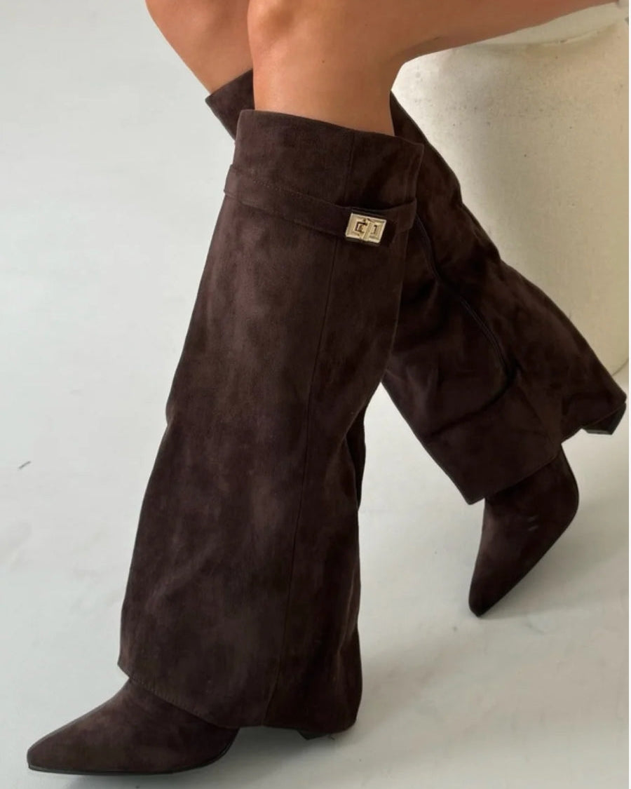 Black knee-high boots with pointed toes and side zipper, from Lumina Wear's Isabella collection.