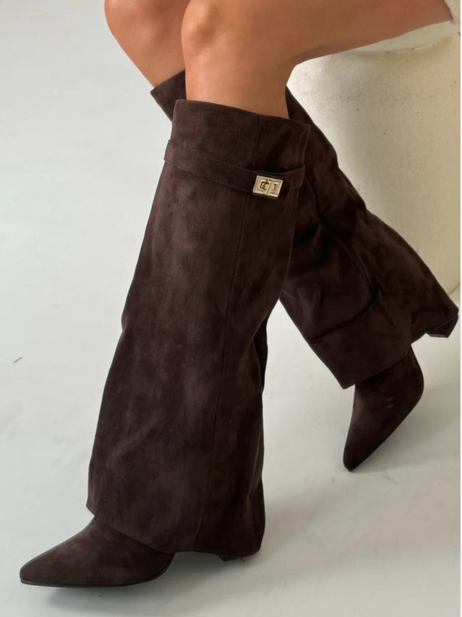 Black knee-high women's boots with pointed toes and side zipper from Lumina Wear's Isabella collection.