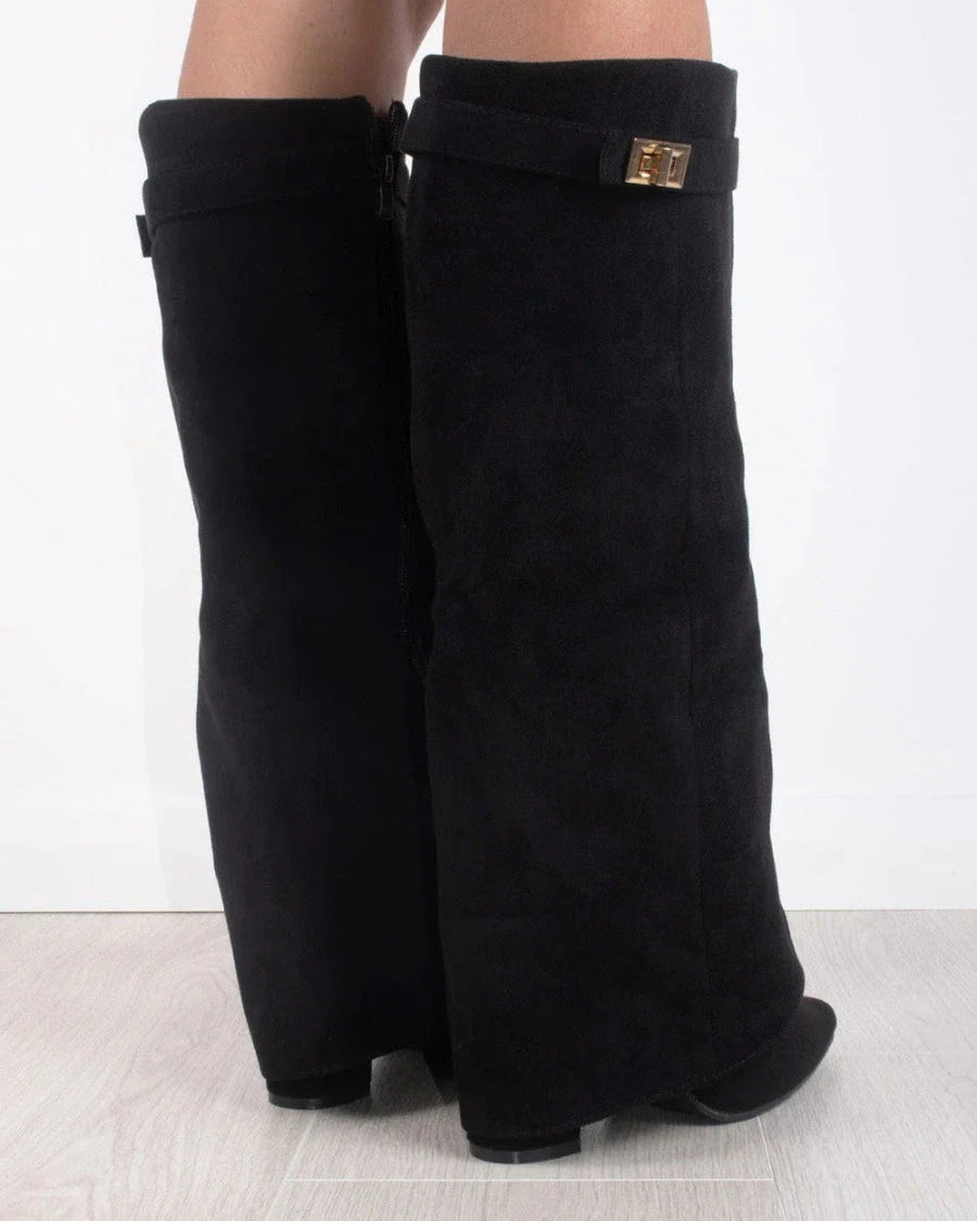 Black knee-high boots with pointed toes and side zippers from Lumina Wear's Isabella collection.