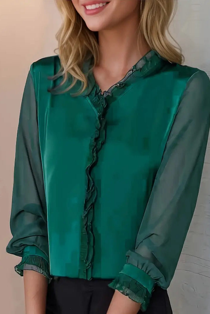Lumina Wear Isabella elegant ruffle blouse with flowing sleeves, featuring delicate ruffle details and a stylish, feminine design.