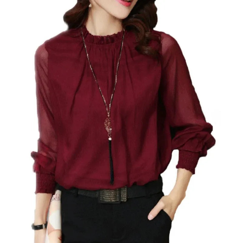 Lumina Wear Isabella elegant ruffle blouse featuring graceful sleeves and feminine design, perfect for stylish casual or formal wear.