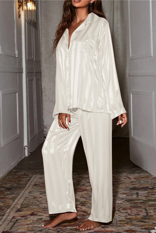 Elegant satin stripe pajama set by Lumina Wear featuring a button-front top and wide-leg pants, shown in a stylish sleepwear design.