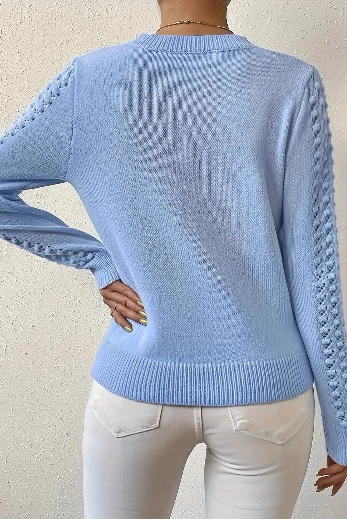 Lumina Wear Isabella fitted pointelle knit sweater with puff shoulders, showcasing a stylish and cozy women's jumper.