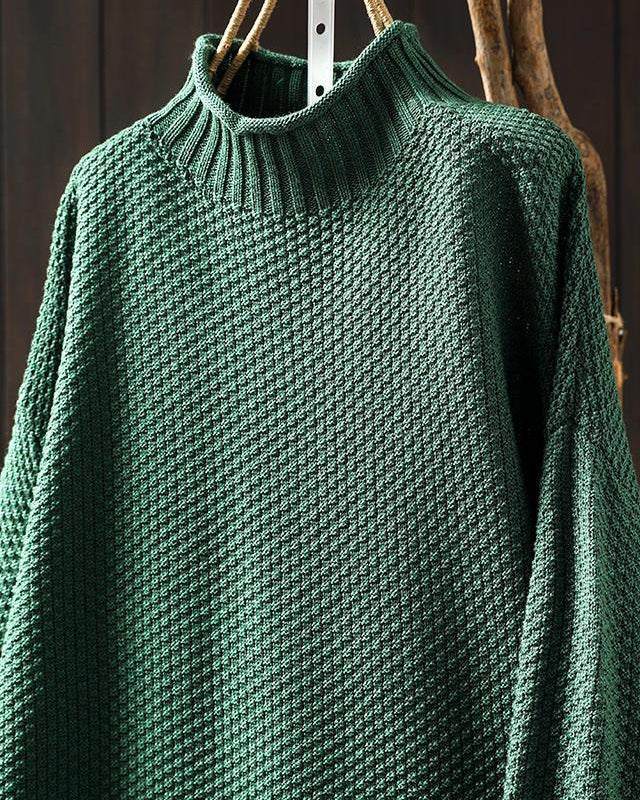 Lumina Wear Isabella high-neck textured knit sweater with a relaxed fit, showcasing cozy fabric and stylish silhouette.