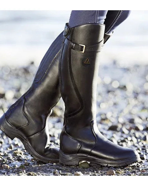 Lumina Wear Isabella knee-high buckle strap boots with ridged sole, stylish leather footwear for trendy fashion statements.