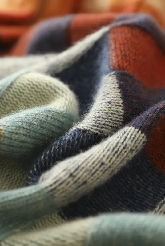Multi-color checked relaxed fit sweater with mock neck from Lumina Wear, featuring a cozy and stylish design.