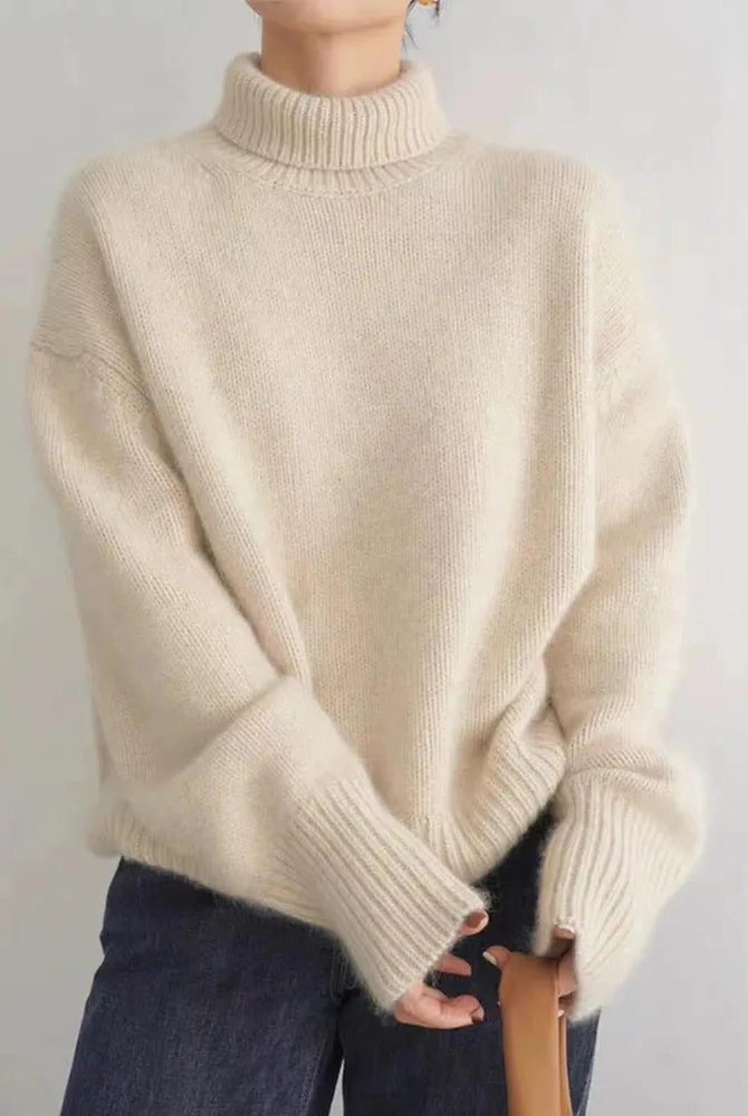 Lumina Wear Isabella oversized black turtleneck sweater with relaxed fit, featuring soft knit fabric and cozy style.
