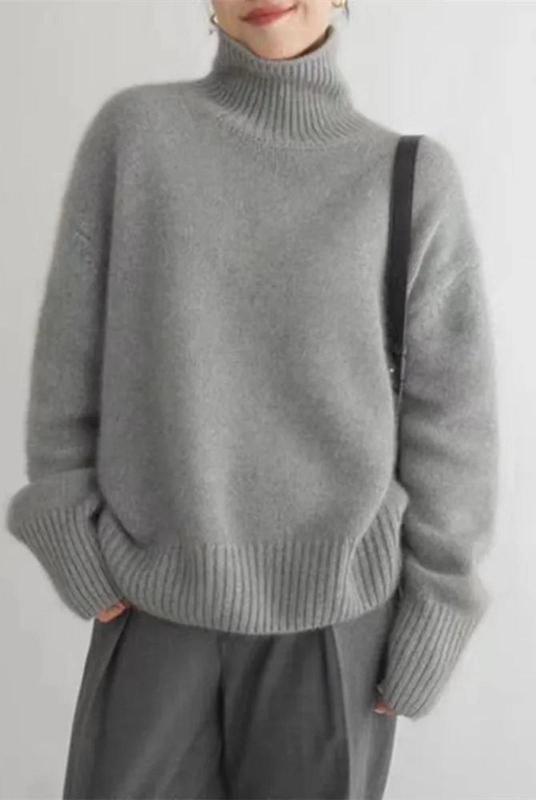 Lumina Wear Isabella oversized black turtleneck sweater with relaxed fit, featuring a cozy, stylish knit design.