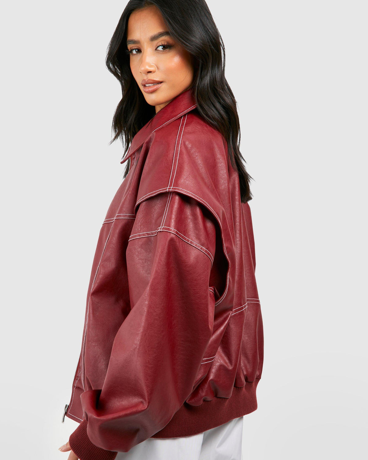 Isabella oversized black vegan leather bomber jacket with ribbed cuffs, stylish and trendy from Lumina Wear.