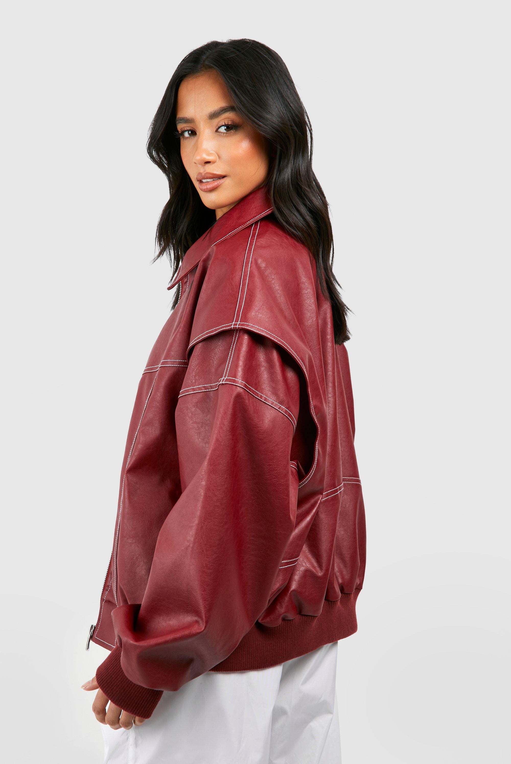 Black vegan leather bomber jacket with ribbed cuffs, oversized fit, from Lumina Wear's Isabella collection.