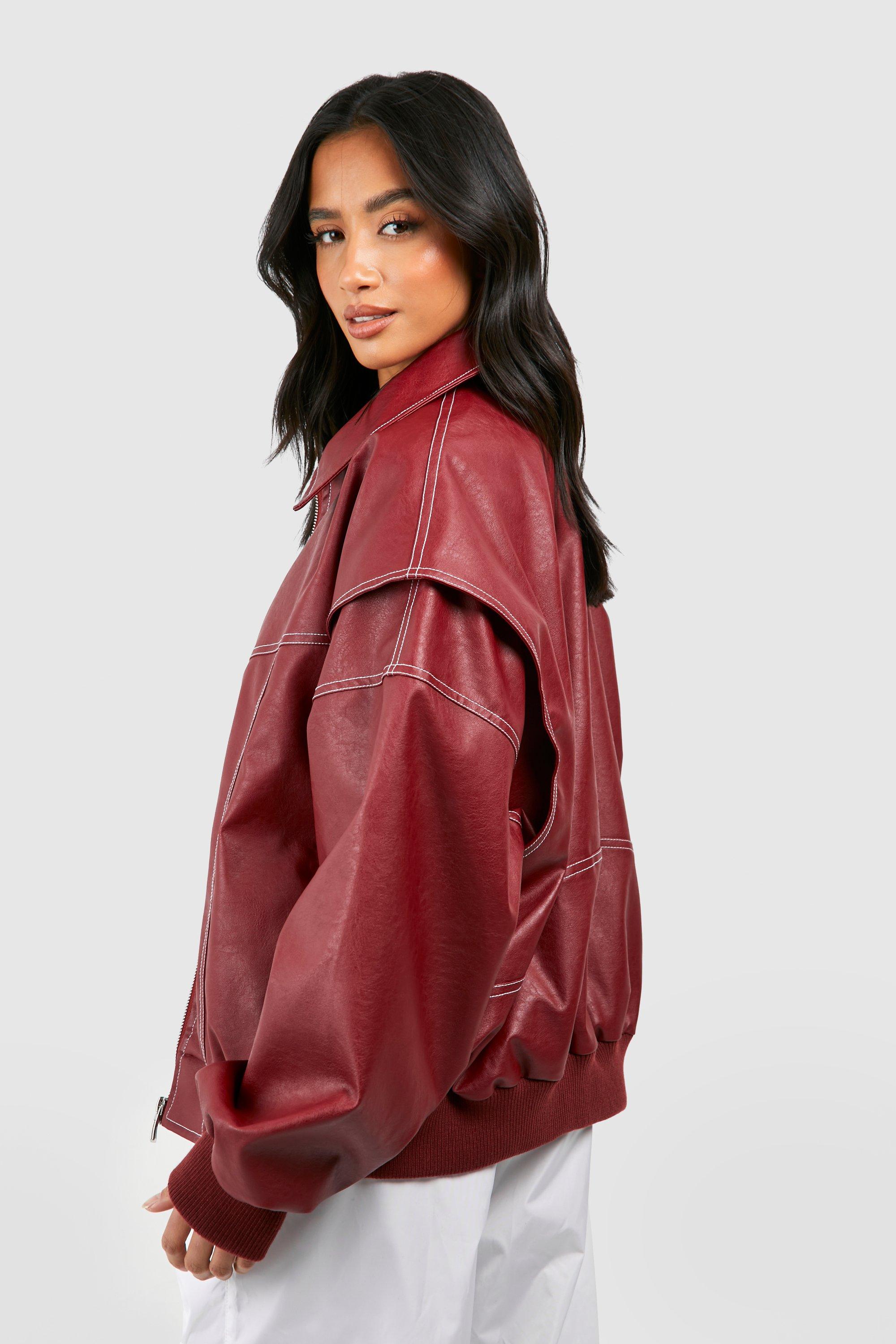 Black vegan leather bomber jacket with ribbed cuffs, oversized fit, from Lumina Wear's Isabella collection.