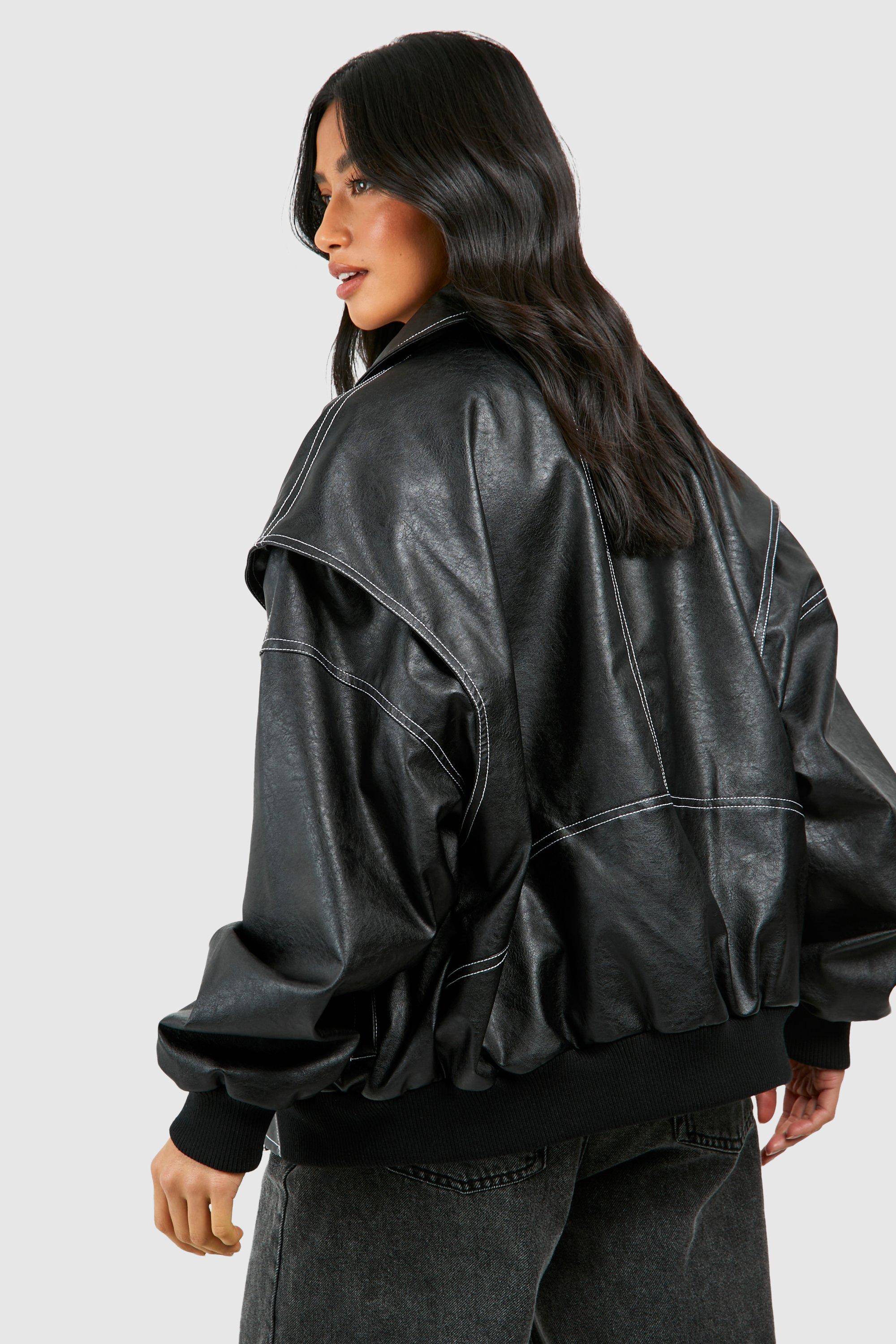 Isabella oversized black vegan leather bomber jacket with ribbed cuffs by Lumina Wear, styled with a relaxed fit and modern design.