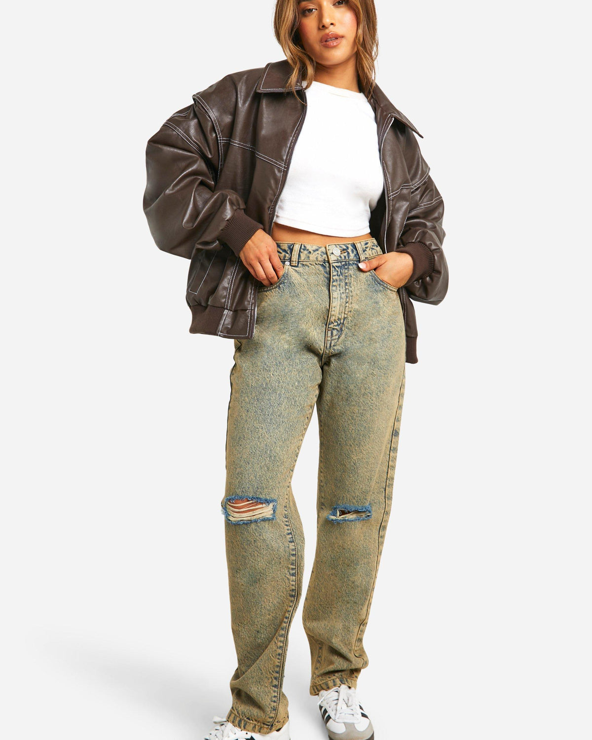 Isabella oversized black vegan leather bomber jacket with ribbed cuffs, stylish Lumina Wear jacket on model.