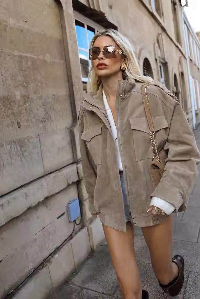 Isabella wearing Lumina Wear Anouk oversized boxy fit utility jacket with stand collar, featuring durable fabric and utility pockets.