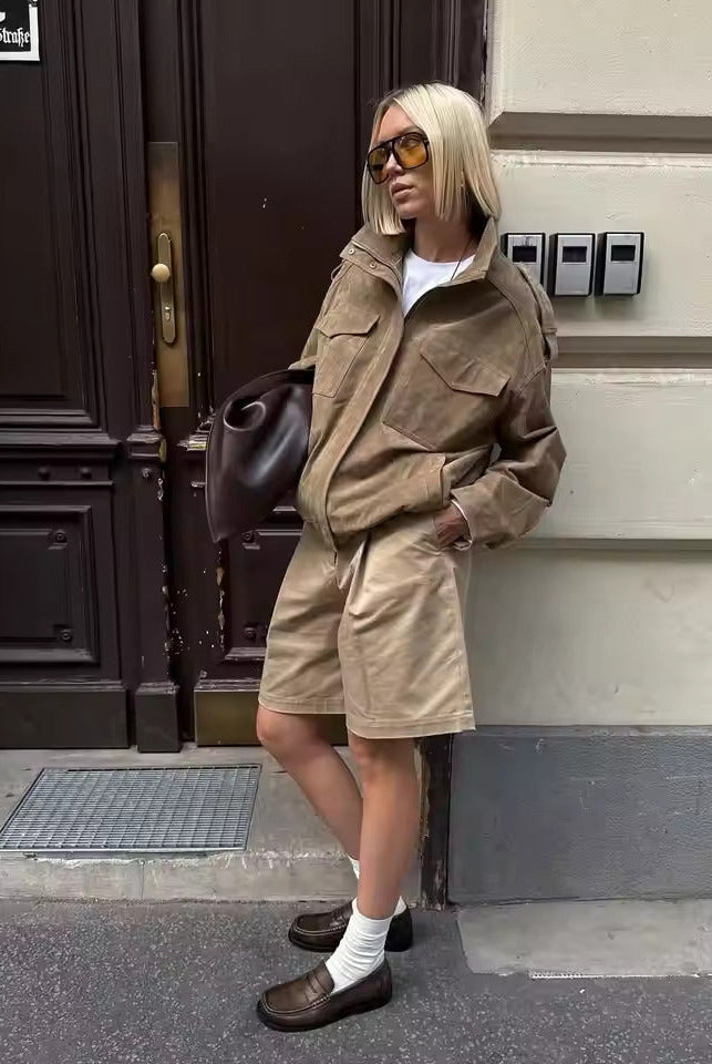 Isabella wearing Lumina Wear's oversized boxy fit utility jacket with stand collar, featuring durable fabric and functional design.