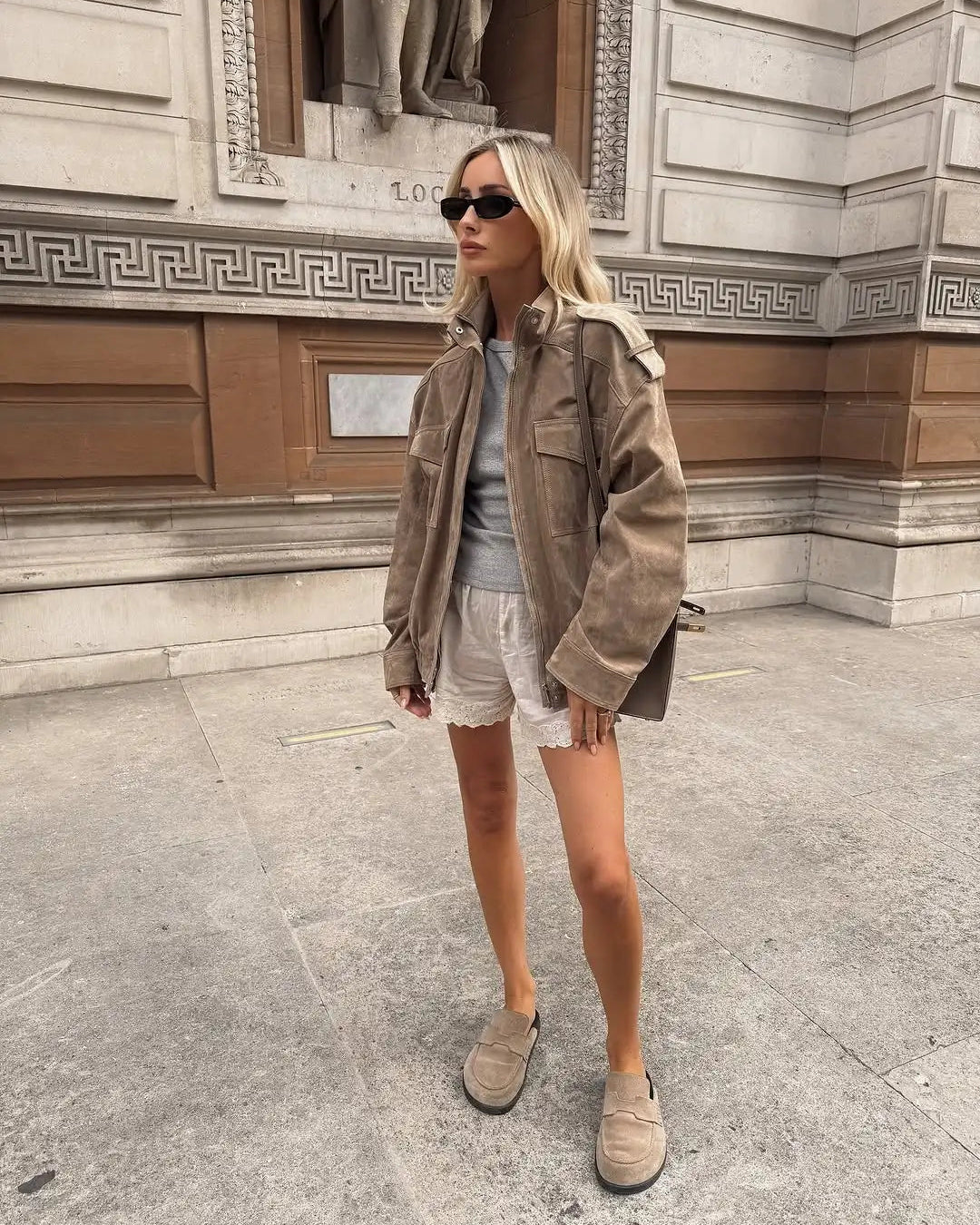 Isabella Lumina Wear oversized boxy utility jacket with flap pockets, displayed on model with neutral background.