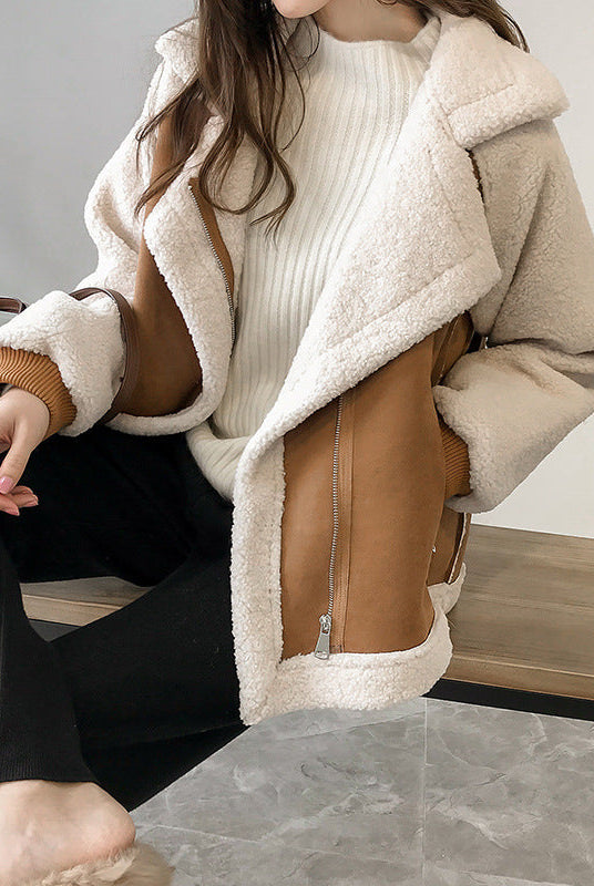 Lumina Wear Isabella oversized plush cream shearling jacket with asymmetric zip, featuring a cozy, plush texture and stylish design.