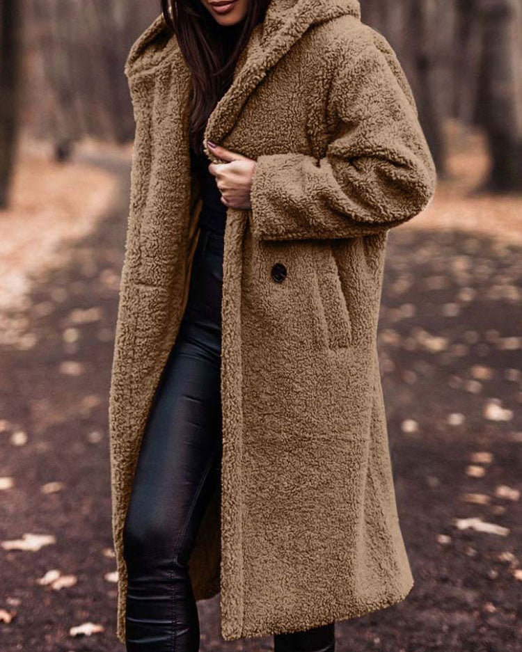 Lumina Wear Isabella oversized plush teddy fleece winter coat with notched lapel, shown on a hanger.