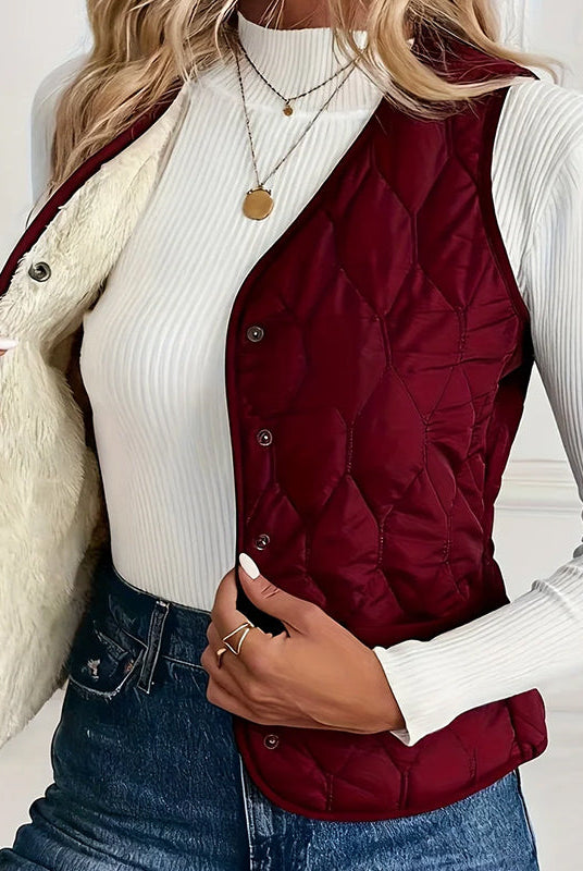 Lumina Wear Isabella quilted snap-front vest with sherpa lining, showcasing a stylish, warm sleeveless outerwear piece.