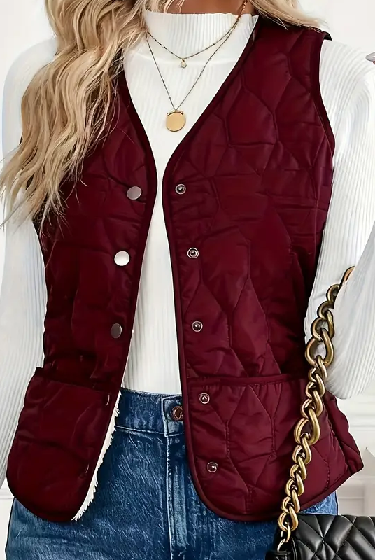 Lumina Wear Isabella quilted snap-front vest with sherpa lining, showcasing warm and stylish outerwear perfect for layering.